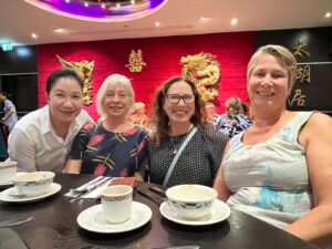 Four women seated at a table at a Chinese restaurant